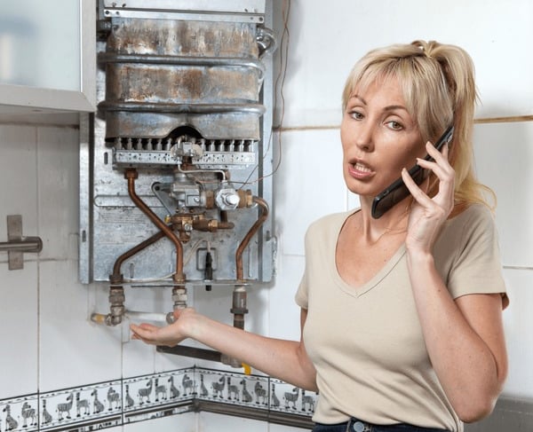 a woman talking on the phone while holding a cell phone