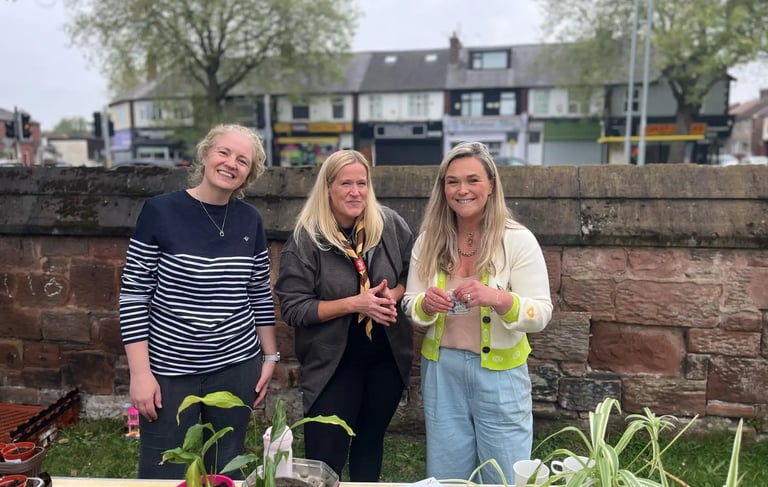 3 leaders outside in Grassendale on a fundraising event
