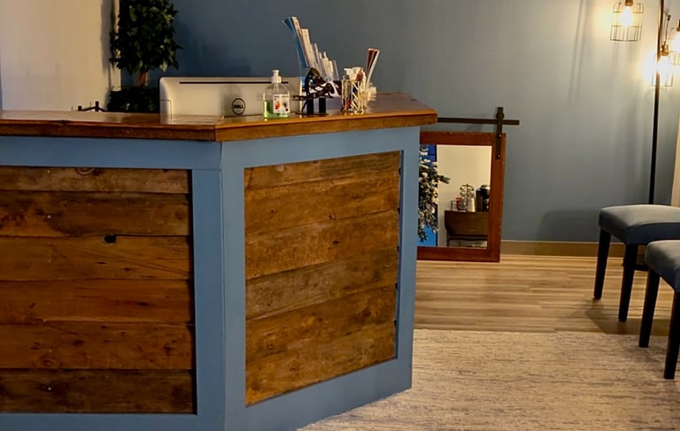 front desk with waiting chairs