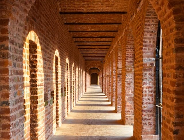 Andaman trip details - Sunlight streaming through the historic brick corridors of Cellular Jail in Port Blair.