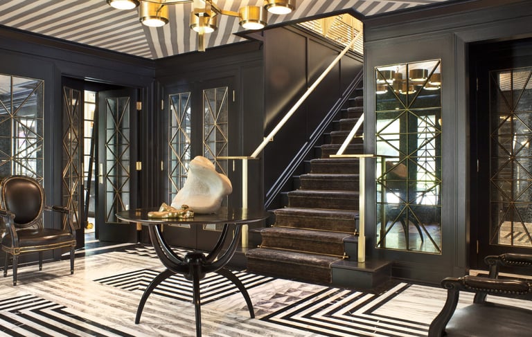 a room with a staircase and a staircase