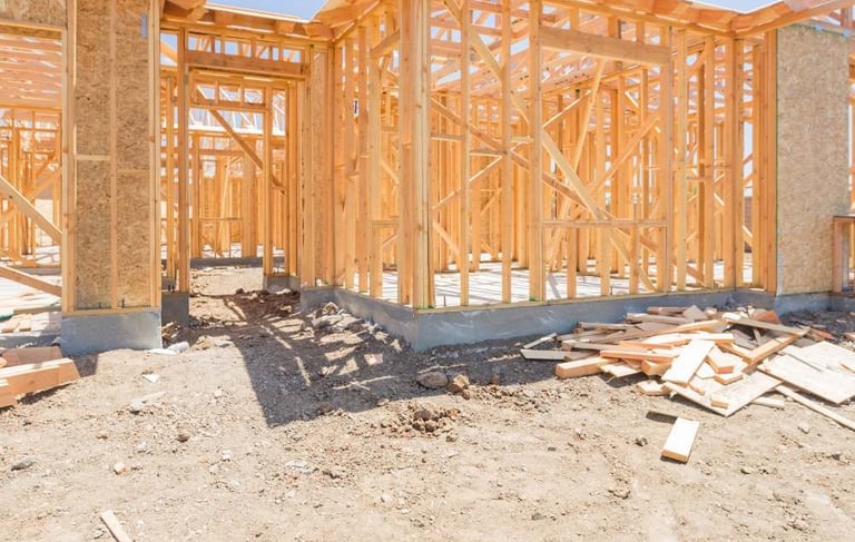 a house being built with wooden framing and framing