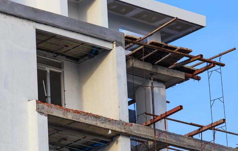 a building with a clock tower in the background