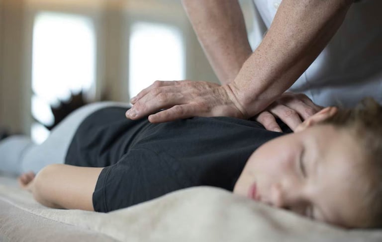 female enjoying massage in Wollongong Clinic