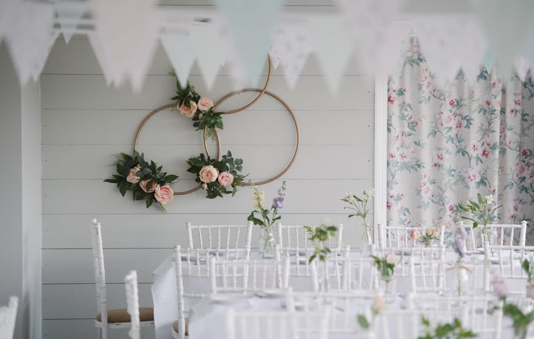 the ark northampton dressed for a wedding reception with white chairs and linen