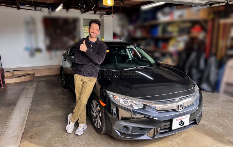 Guy standing in front of 2016 Honda Civic