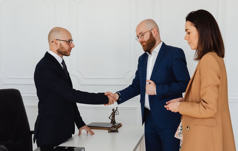 Business professionals shaking hands during a partnership meeting
