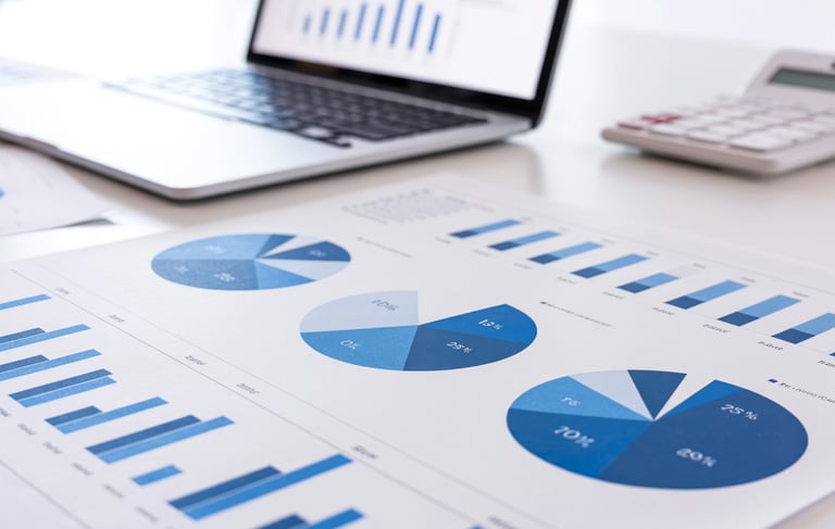 Clean financial reports and charts showing organized bookkeeping and clear financial visibility.