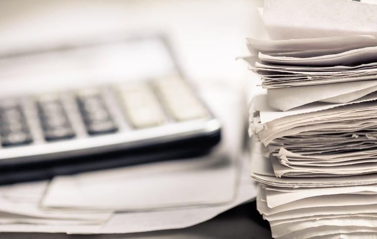 Disorganized bookkeeping records and receipts needing cleanup and catch-up bookkeeping services.
