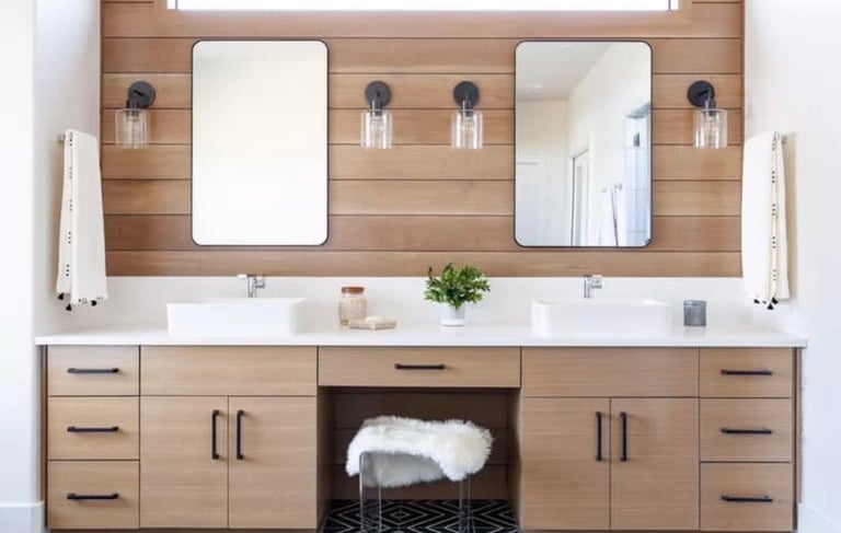 a bathroom with a wooden vanity and a mirror