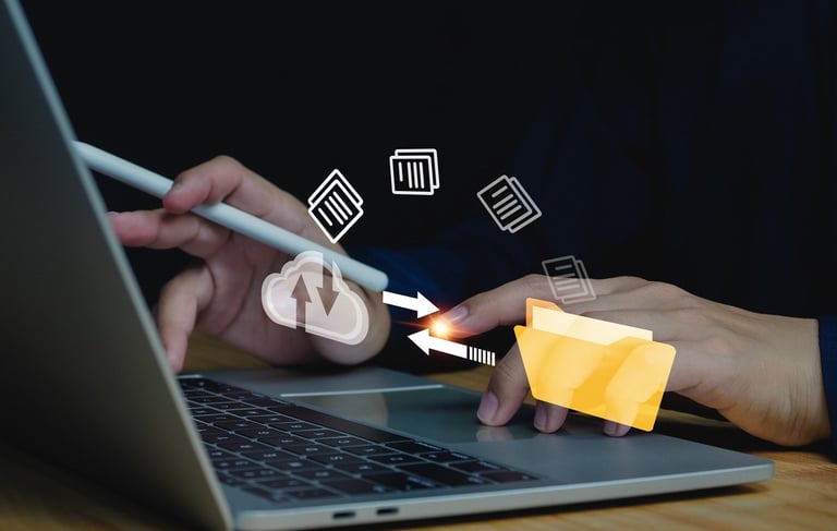 Image showing files migrating from laptop folder to cloud