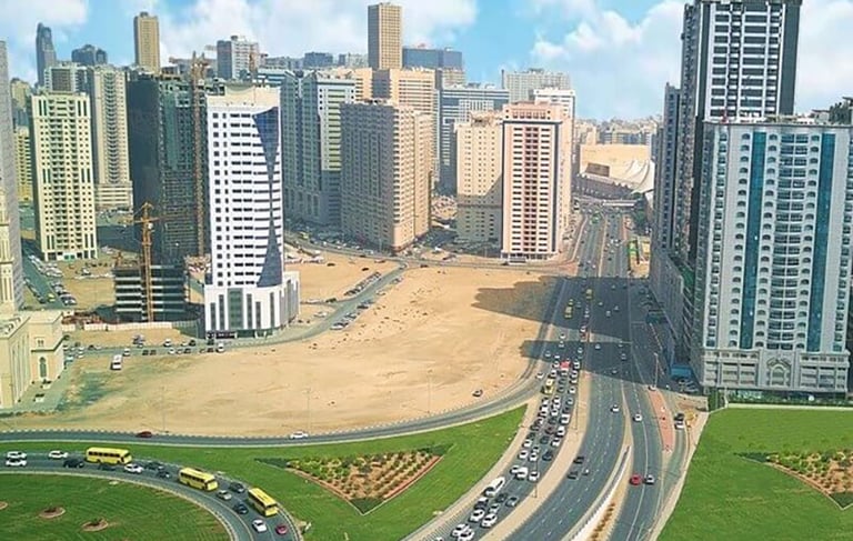 a cityscape of a city with a lot of traffic