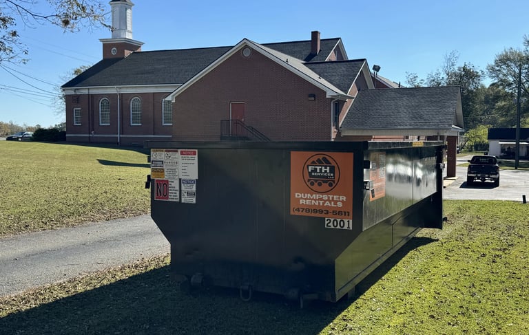 Roll Off Dumpster In Front of a Church