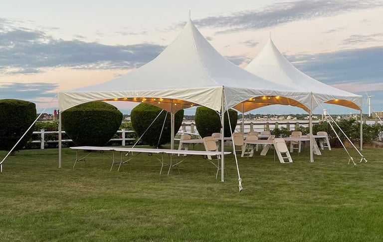 20x49 white tent, outdoor event, tables, chairs