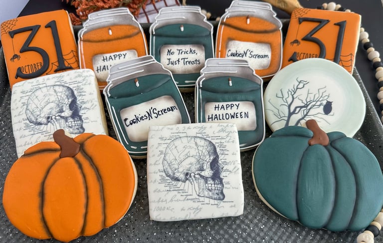 a tray of cookies decorated with halloween decorations
