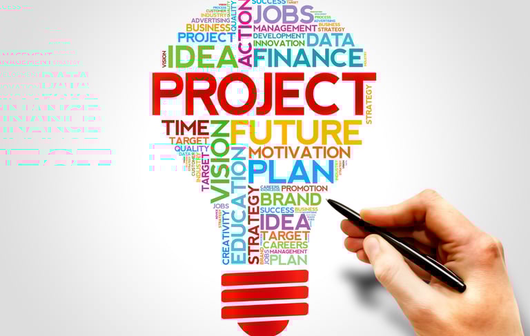 Illustration of a light bulb filled with colourful business words like PROJECT, STRATEGY, and VISION
