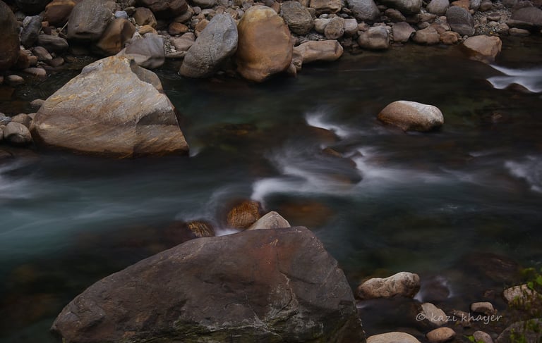 An image of river water captured in motion blur.