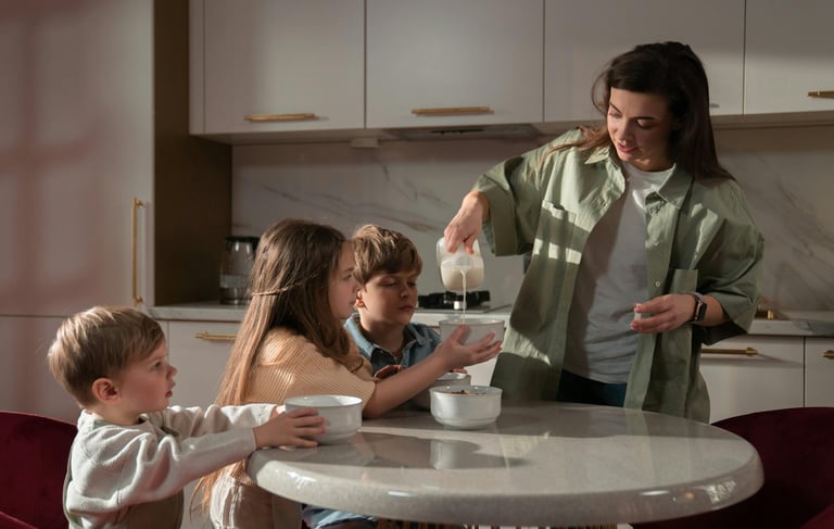 a woman is pouring milk into a bowl of milk