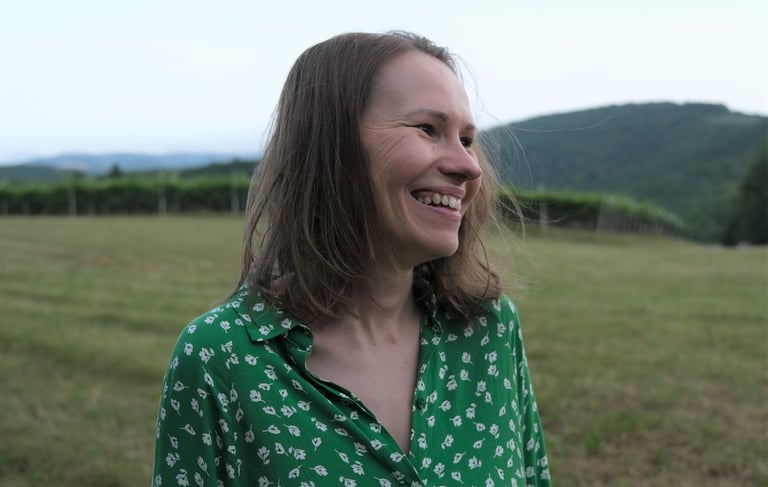 a woman in a green dress