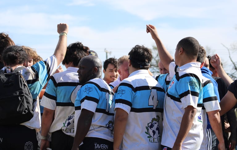 a group of people standing around a group of people