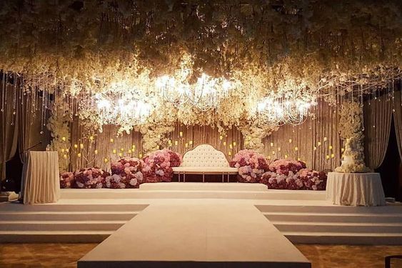 a stage with a stage and flowers