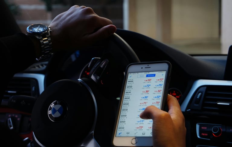 Man looking at mobile phone trading cryptocurrency in decentralized finance