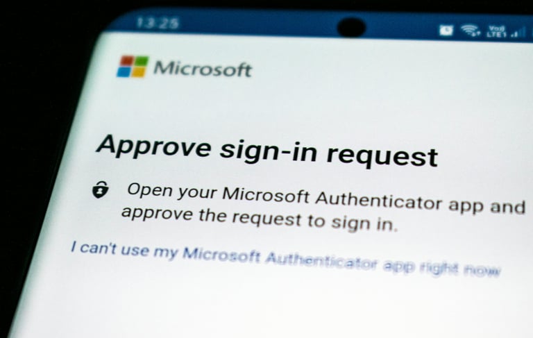 Cell phone displaying an approved sign-in request, illustrating two-factor authentication (2FA) for 
