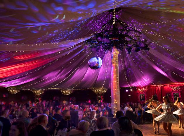 An image of a crowd watching a traditional ceilidh