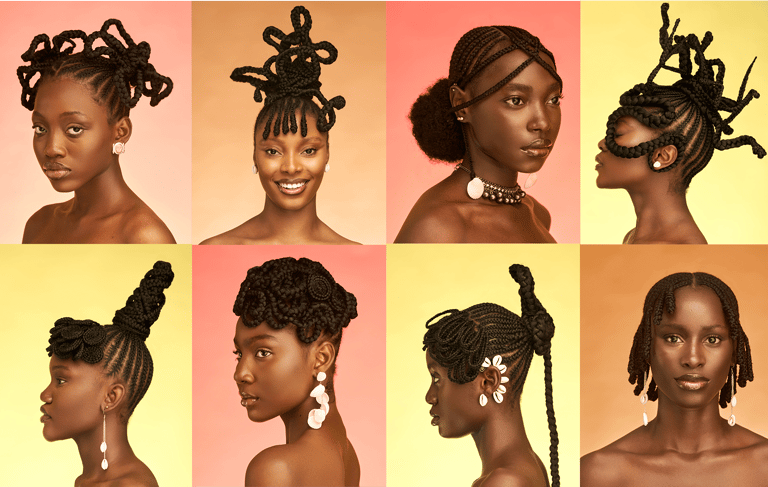 A group of African women in large braided avante garde African Hair styles