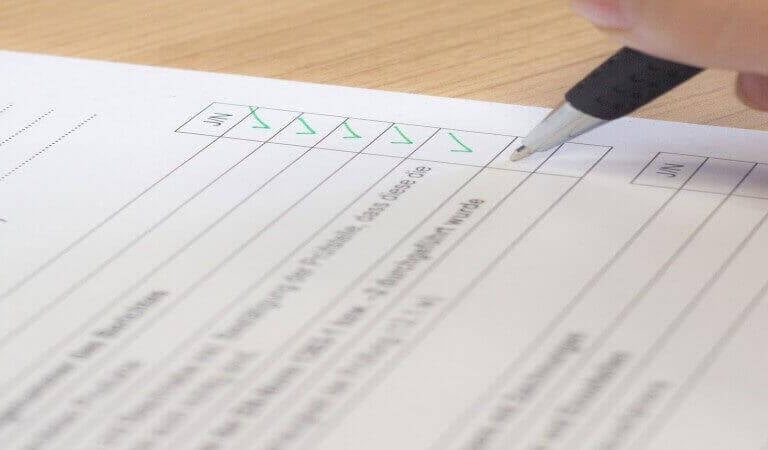a stock photo of a race director checklist being completed