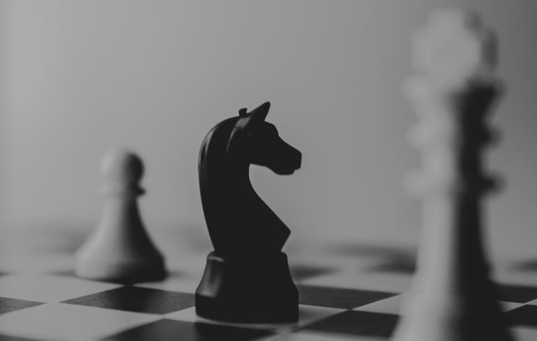 a chess game with chess pieces on a chess board