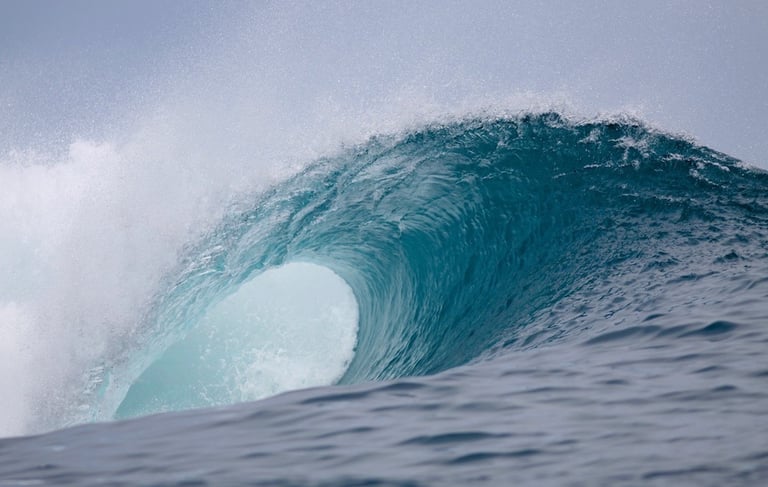 Perfect barreling wave at Telescopes surf break in Mentawai Islands