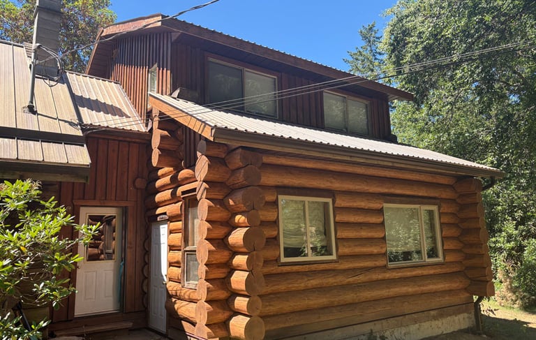 Log home in Courtenay after restoration by Embassy Restorations Vancouver Island