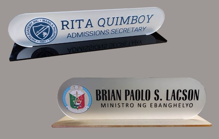 Rita Quimboy and Brian Lacson. Desk name plate