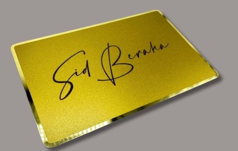Gold Metal NFC card with the name Sid beraha on it in cursive