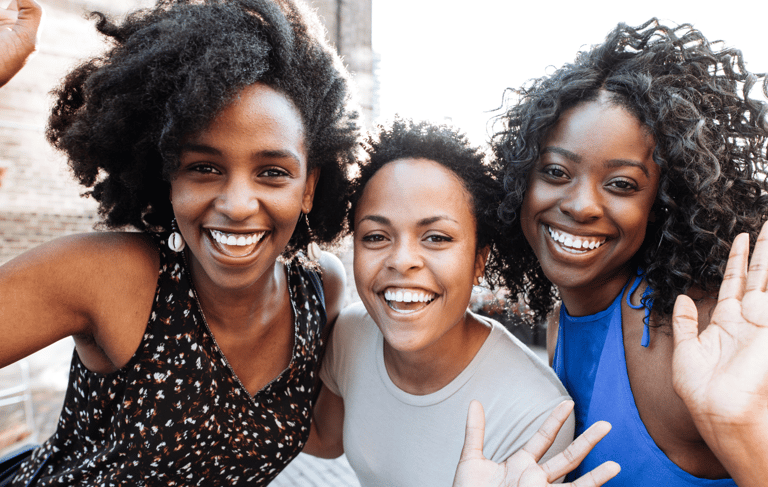 Smiling faces of diversity in the energizeHER Village for Girls membership