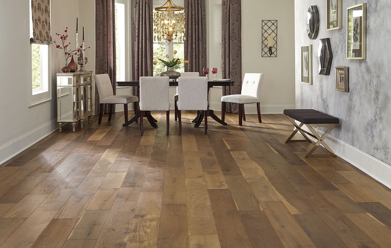 Beautifully finished hardwood floor in an elegant dining room, with a warm, medium toned wood.