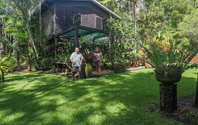 Man and woman in garden at home
