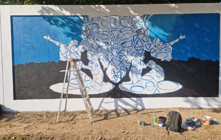 Mural street art in progress on a white Wall at Centro Recreacional Mokanranko