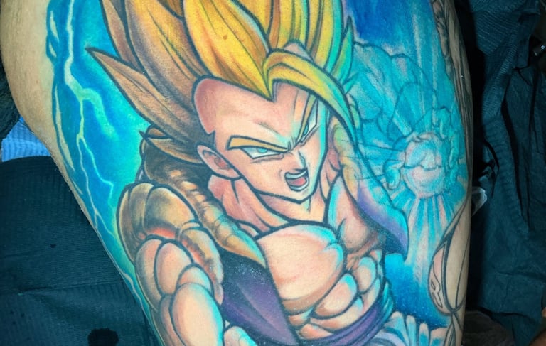 Tattoo of a dragon ball on a man's arm. Done by expert tattoo artist in Miraflores