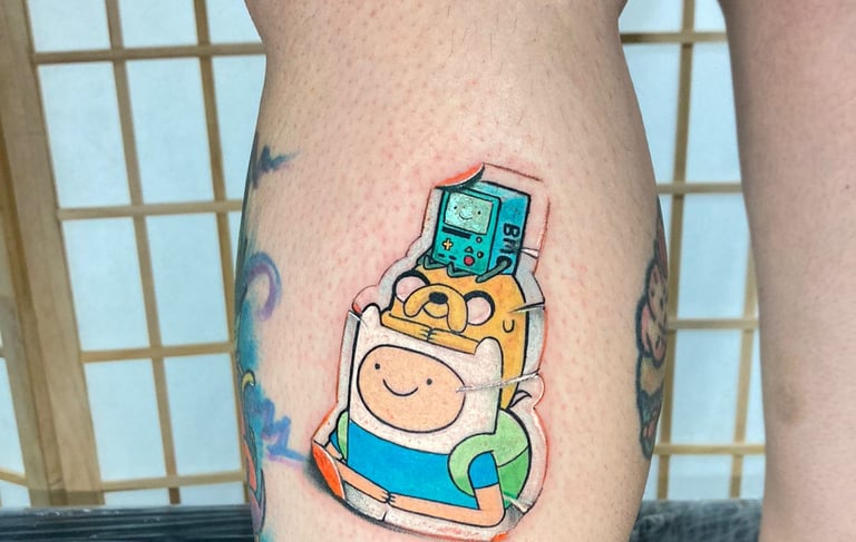 Sticker Tattoo style in the leg. custom piece by Katarsis Tattoo Perú