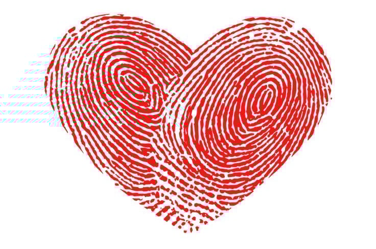 Heart made of fingerprint lines symbolizing relationship patterns, emotional connection, and self-aw