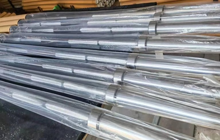 Finished barbells packaged for bulk shipment and wholesale distribution