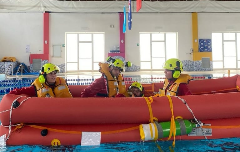 Pool Rescue Drill – Trainee practicing water rescue techniques with a life jacket during a HEMS