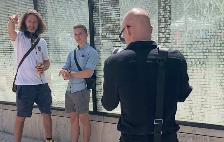 a man recording a video of a man who is presenting for his youtube video