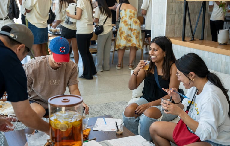 Happy guests gathered around our mobile boba bar for a fun event experience