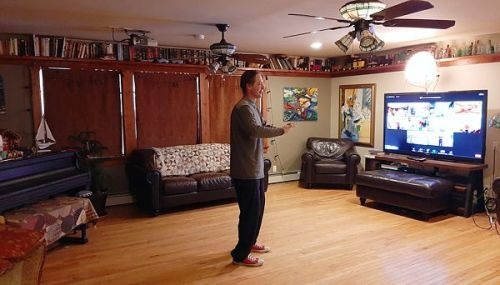 Johnny teaching Tai Chi for Health on Zoom from home.