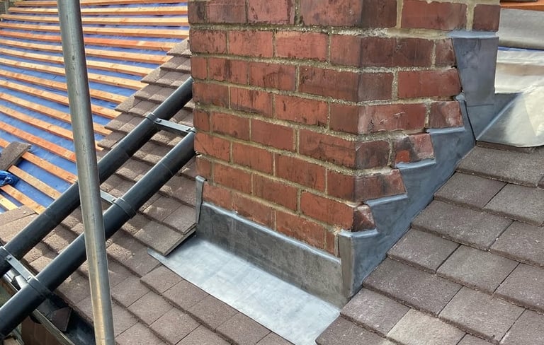 Replacing chimney flashing in progress