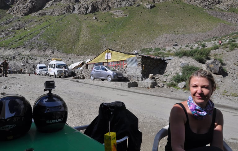 Tracey Billington riding the Leh to Manali highway over the great Himalayan range, Ladakh, India 