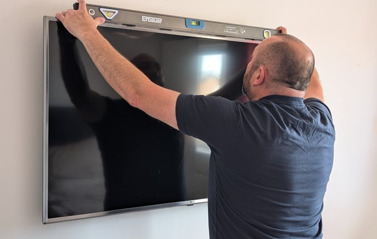 Me hanging a TV